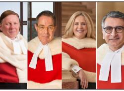 Four Supreme Court of Canada Justices are shown wearing their official scarlett fur-trimmer robes. Three men and one woman.