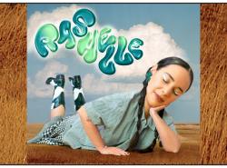 A artists rendering of a woman with braids on her belly on a field of brown grasses. She leans her head on the hand, eyes closed in a dreamy fashion. He cow hide boots stick up behind her into a cloudy sky. It reads Rachelle in a balloon font above her heels.