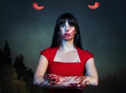 A women in a red dress looks towards the camera. Her face has a bloody hand print over her mouth. Her arms are folded in front of her and are covered in blood. Two red eyes peer at her through a dark sky behind her.
