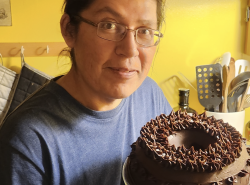 Xavier Kataquapit and his chocolate cake.