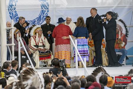 Pope Francis returns two pairs of children's moccasins given to him in April as promised